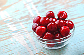 Sweet cherries in glass bowl
