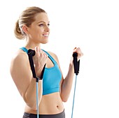 Woman using resistance band