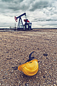 Oil pump and protective helmet