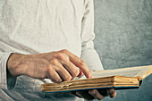 Man reading old book