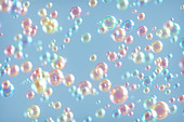 Bubbles against blue background, illustration