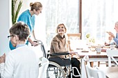 Woman in wheelchair smiling