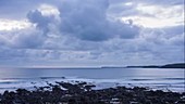 Clouds and coastal seascape, time-lapse footage