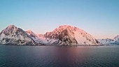 Snowy mountains on coast