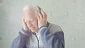 Elderly man with headphones