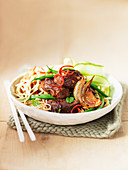 Noodles with lamb, green beans, mint, chilli, and cucumbers