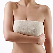 Woman's bandaged chest