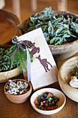 Homemade tea in paper bag decorated with felt deer