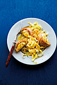 Caribbean coconut and curry lobster with mango noodles