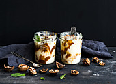Walnut and salted caramel ice-cream in glass jars
