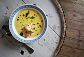 Cod and coconut soup with parsley oil