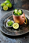 A Moscow Mule with vodka, lime and mint in a copper cup
