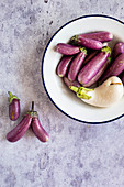 Purple and white baby eggplants