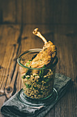 Guinea fowl breast with barley and herbs in a jar