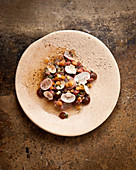 Dry-aged sirloin tartar with oyster sauce and beef drippings