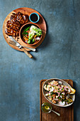Teriyaki rib-eye pork steaks with stir-fried vegetables - Grilled endive and walnut salad