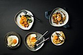 Fried eggs with curry butter, hot paprika, burnt sage butter and garlic mayo