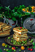 Grated cake with apricots on a concrete surface. Dark background