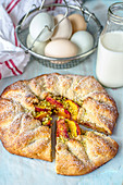 A galette with fruit and pistachios