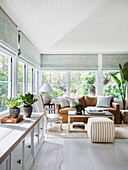Bright winter garden with lowboard and lounge area