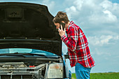 Woman with broken downcar