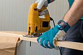 Carpenter using jigsaw