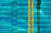 Construction crane and skyscraper