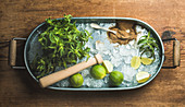 Ingredients for making mojito summer cocktail in metal tray