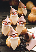 Brioche gnomes decorated with marzipan for Christmas