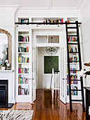 Built-in bookcase with library manager around the door