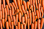 Carrots on a black surface