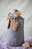 Heart-shaped pendants with waffle structure on old metal churn