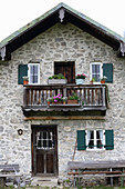 Façade of mountain cabin in Fell (Mangfall Mountains, Germany)