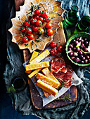 Polenta Chips with prosciutto and roast tomato platter