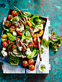 Lamb and tomato salad with swiss chard and feta