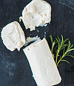 Slice of Goats Cheese with Goat Cheese Log