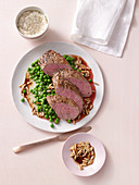 Beef fillets with pine nut butter and chervil peas