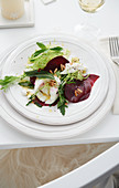 Beetroot salad with mozzarella and pine nuts for Christmas
