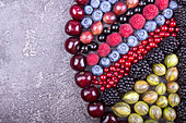 Geometric pattern of summer fruits and berries