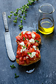 Bruschetta with fresh tomatoes, feta and oregano