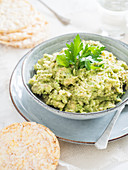 Guacamole served with rice cakes