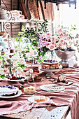Festive cake buffet decorated with roses