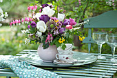 Colorful Spring Bouquet With Tulips And Flowering Branches