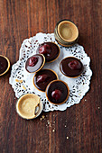 Mini chocolate tartlets with sour cherries