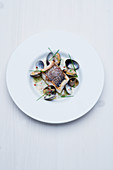 Bass with clams and a chilli and chive sauce