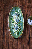 Pickled mackerel on a grapefruit, green mango and glass noodle salad