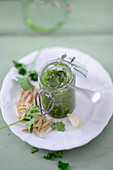 A jar of parsley pesto