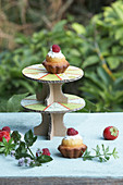 Cake stand made from cardboard and sewn paper