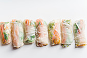 Vegan spring rolls with tofu, marinated carrot and daikon
