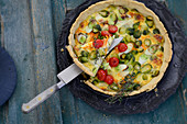 Brussels sprouts quiche with cherry tomatoes